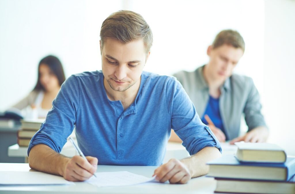 IELTS Students in a classroom studying for their IELTS Exam