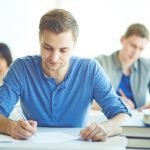 IELTS Students in a classroom studying for their IELTS Exam