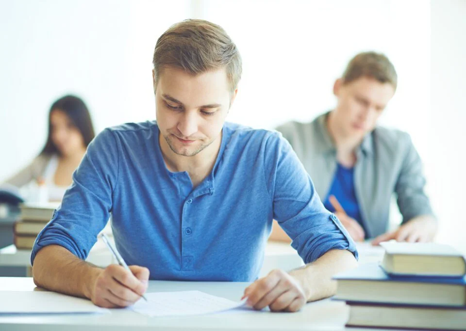IELTS Students in a classroom studying for their IELTS Exam