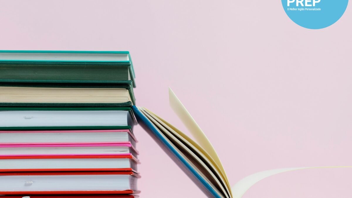 stacked books and a open book representing toefl reading studies at englishprep