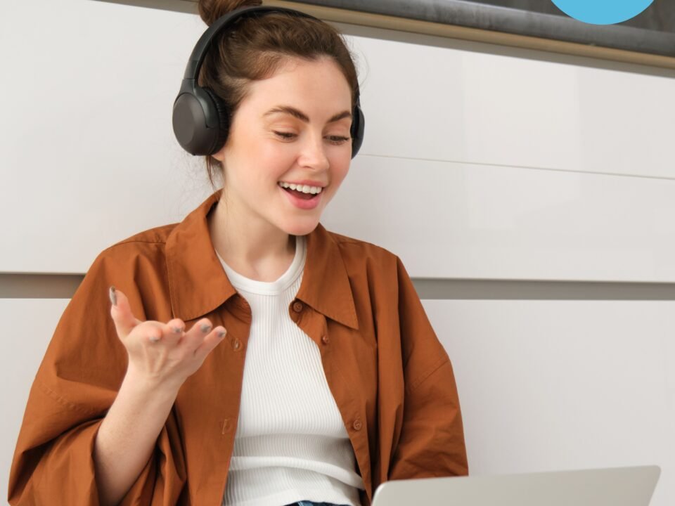 ielts speaking student with laptop and headphones practicing her speaking skills with private instructor