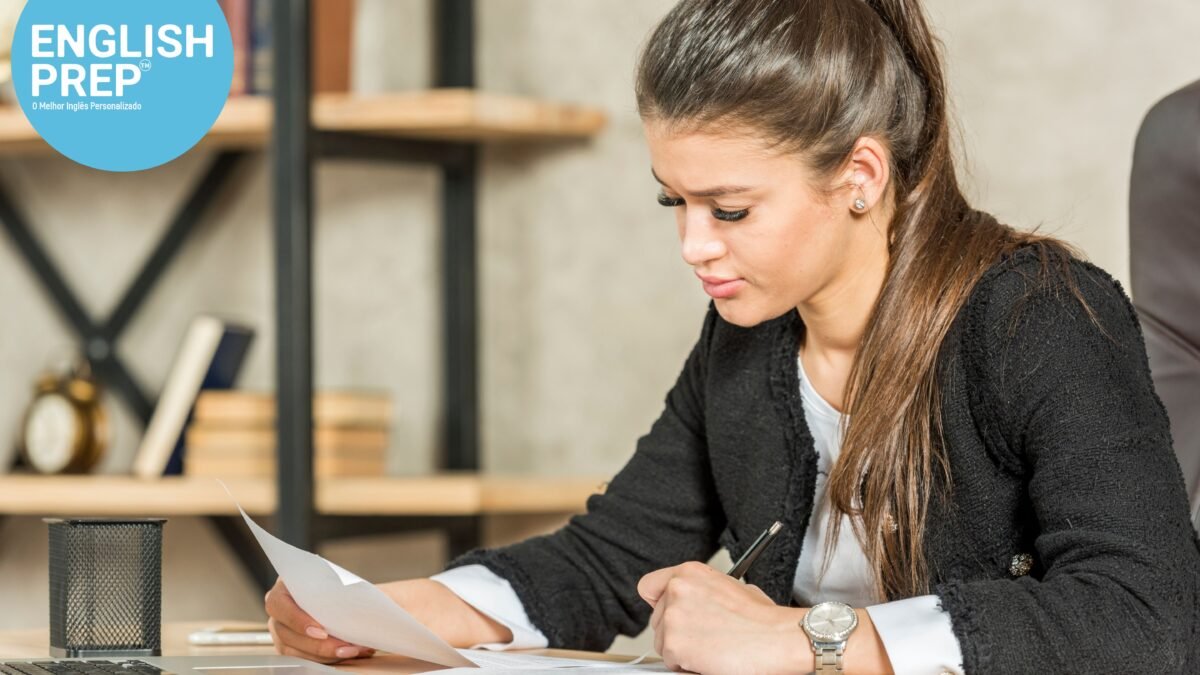 ielts examiners looking over a students writing test with formal clothing in office